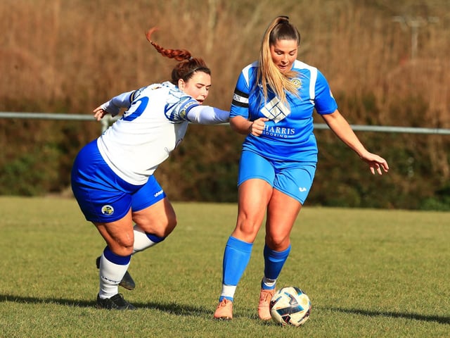 Lidhook's Bobbie Williams, right, and Hawks' Chloe Dark. Picture by Dave Haines