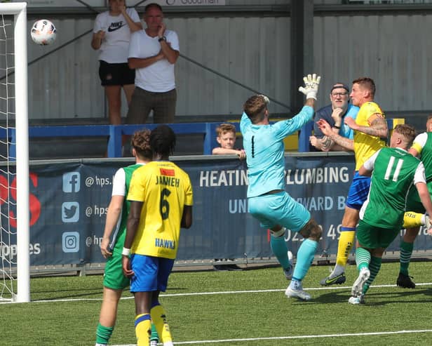 Joe Oastler heads Hawks'' final goal in their 5-1 pre-season friendly win against Moneyfields. Picture by Dave Haines.