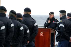 Commander George Storton reminds HMS Dragon's sailors of HMS Ark Royals achievements and sacrifices