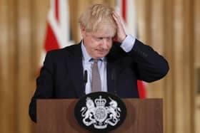 Boris Johnson will make an update on easing of lockdown today. (AP Photo/Frank Augstein, Pool, File)