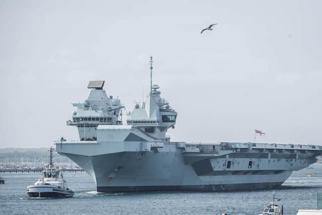 HMS Queen Elizabeth departs from Portsmouth after ship's crew is tested for Covid-19
on Wednesday 29 April 2020.
Pictured: HMS Queen Elizabeth passes the Round Tower, Old Portsmouth .
Picture: Habibur Rahman