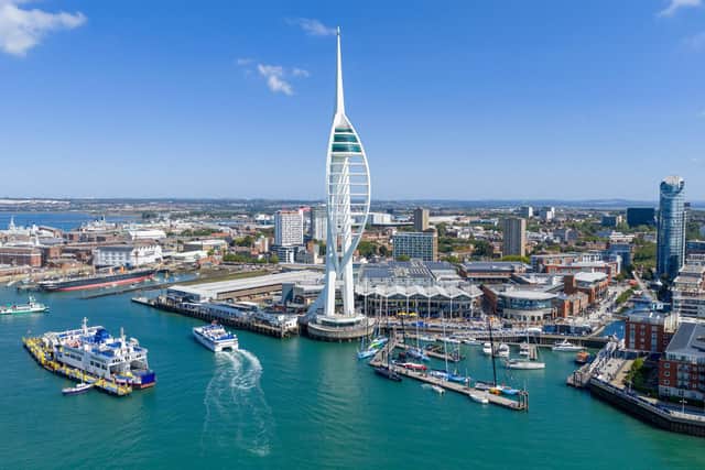 The teams preparing to leave under the Spinnaker Tower.