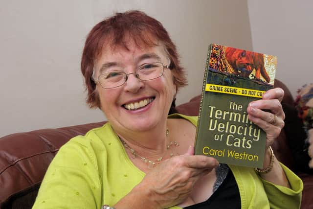 Carol Westron with her first novel, The Terminal Velocity of Cats
Picture: Mick Young