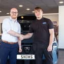 Louis Gaskin, right, with Steven Mulvoy, Aftersales Manager at Snows Peugeot Portsmouth