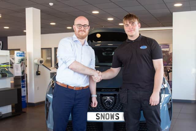 Louis Gaskin, right, with Steven Mulvoy, Aftersales Manager at Snows Peugeot Portsmouth
