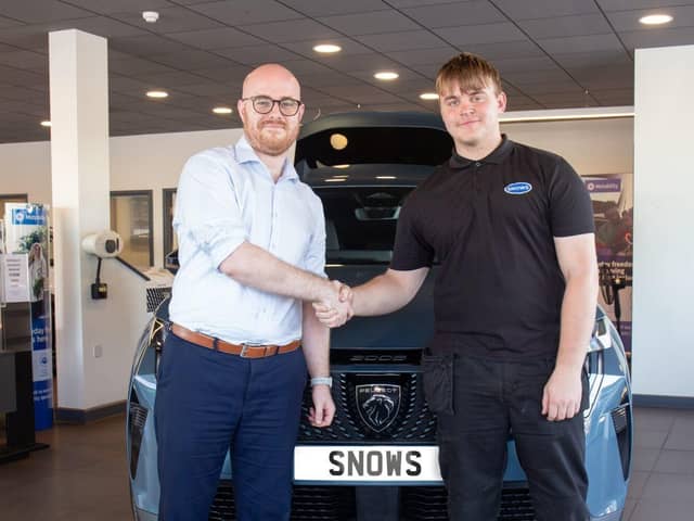 Louis Gaskin, right, with Steven Mulvoy, Aftersales Manager at Snows Peugeot Portsmouth
