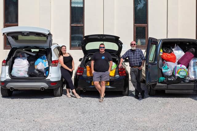 Another three full carloads of donations, soon to be delivered by Liberty Rose, Matt Simmons, and Mal Sturgess from Emsworth Baptist Church. Picture: Mike Cooter (060921)