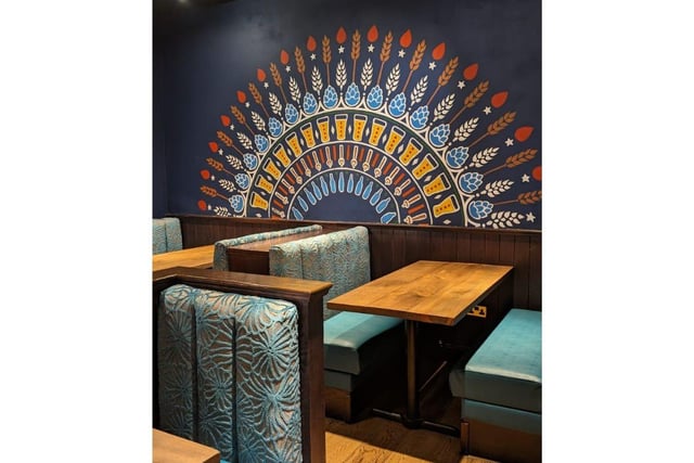 Colourful decorations adorn the Tap & Tandoor evoking their identity as a place for Indian food, craft beer, cocktails and live sport.