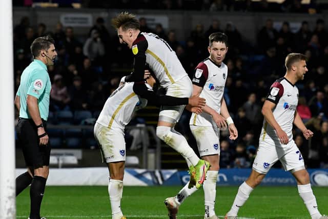 Ronan Curtis celebrates with match-winner Marcus Harness. Picture: Graham Hunt