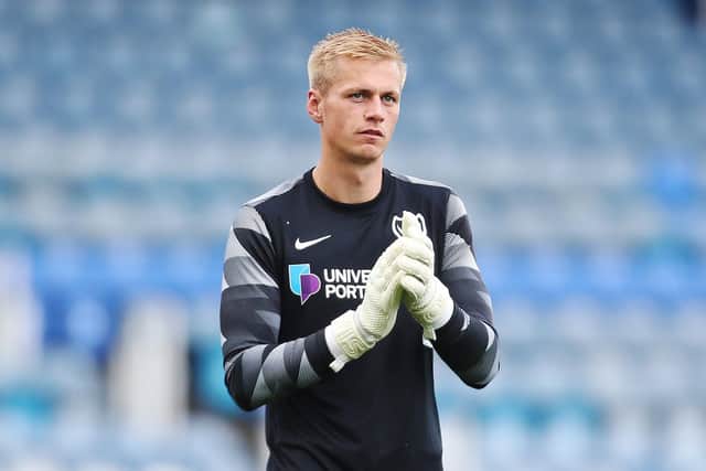 Alex Bass is set to start at Wycombe.