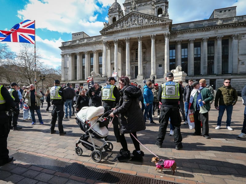 A mother calmly pushes her baby buggy through the scene.  Picture: Chris Moorhouse (150325-065)