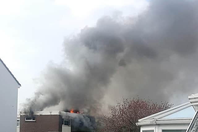 Smoke and flames billow out from the upstairs flat at The Redan in Gosport.

Picture: JCP