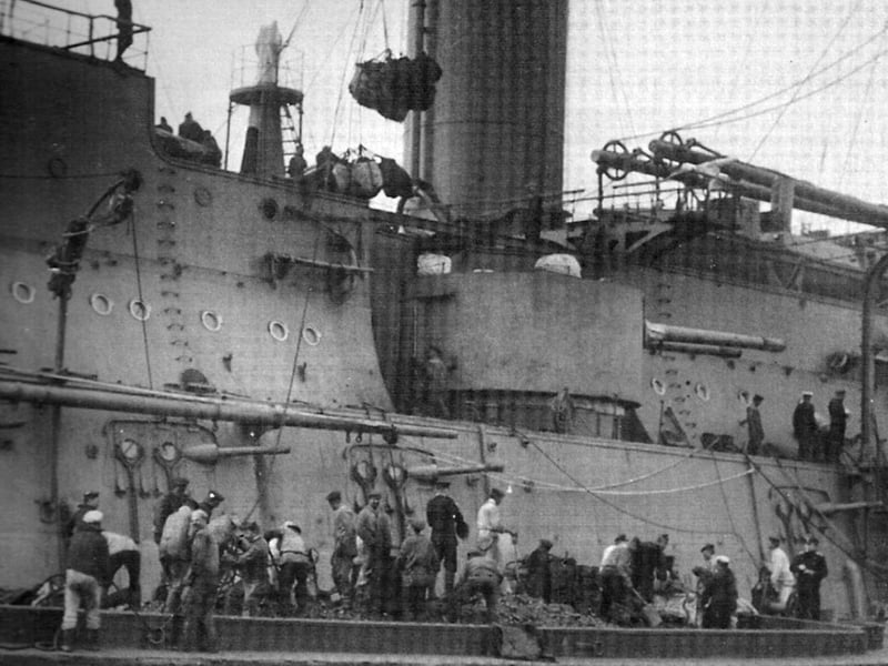 The Russian warship Slava being coaled in Portsmouth. But when?
