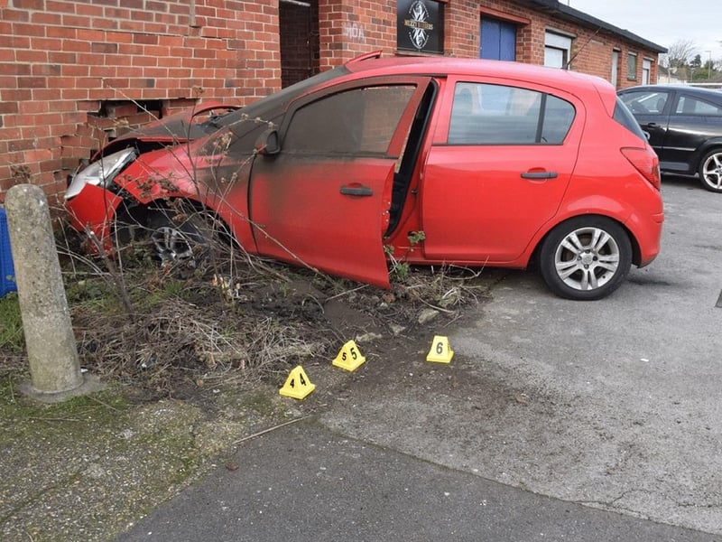 Levi Kent's Vauxhall Astra after it crashed behind shops in Nobes Avenue where he was stabbed