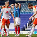 John Marquis dejected after Rasmus Nicolaisen had a chance cleared off the line during Pompey's loss to Blackpool. Picture: Joe Pepler