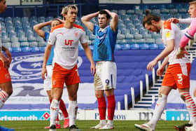 John Marquis dejected after Rasmus Nicolaisen had a chance cleared off the line during Pompey's loss to Blackpool. Picture: Joe Pepler