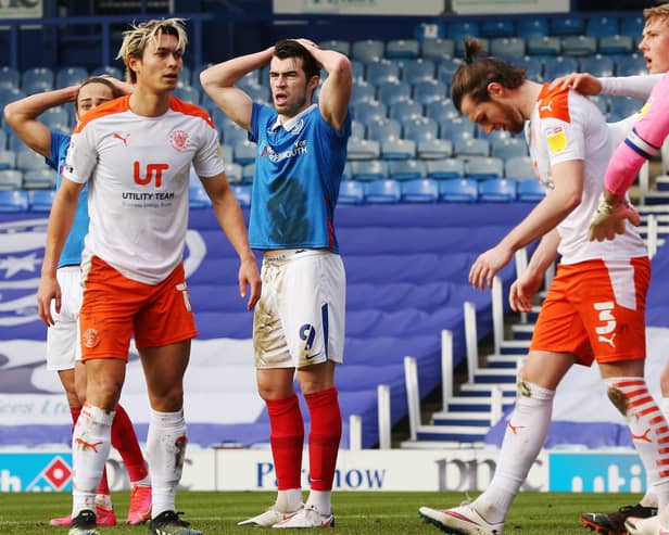 John Marquis dejected after Rasmus Nicolaisen had a chance cleared off the line during Pompey's loss to Blackpool. Picture: Joe Pepler
