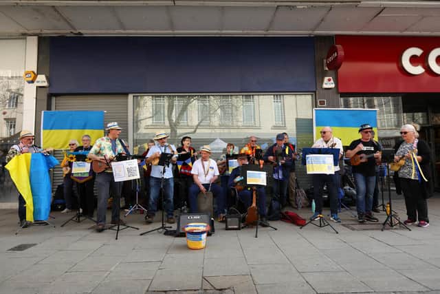 Pompey Pluckers perform on behalf of Ukraine, Commercial Road, Portsmouth
Picture: Chris Moorhouse (jpns 260322-26)