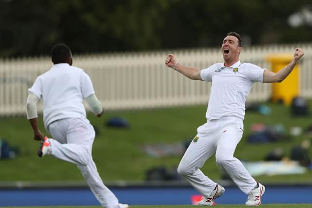Kyle Abbott celebrates after taking the final wicket to give South Africa victory over Australia in Hobart, 2016. Photo by Robert Cianflone/Getty Images.