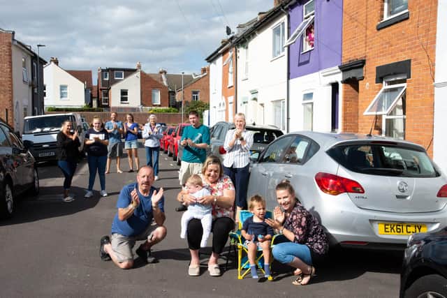 Residents in Brompton Road in Southsea clapping for the NHS. Picture: Emma Terracciano