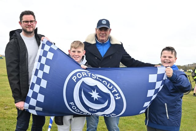 Pompey F.C football fans have been flocking to Southsea Common for the League One celebrations which have been organised by Portsmouth City Council. Pictured: (Left to Right) Gary, Teddy, Gary and Riley YoungsPicture Credit: Keith Woodland