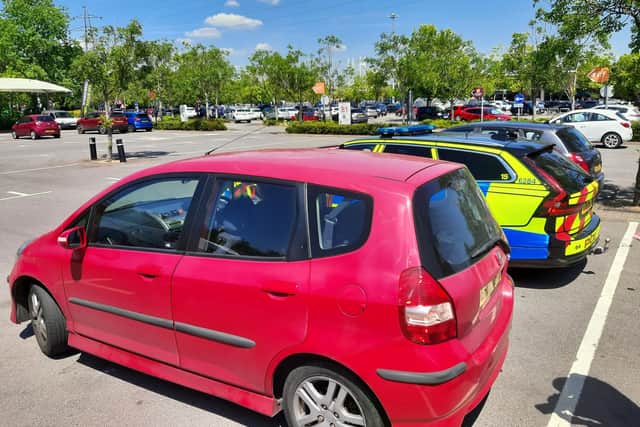 Police issued a ticket to the motorist who was trying to fix his phone while driving along the M27, in Hedge End. Picture: Hampshire Roads Policing Unit.