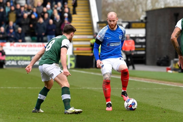 Connor Ogilvie takes on Joe Edwards during Pompey's clash with promotion hopefuls Plymouth. Picture: Graham Hunt/ProSportsImages