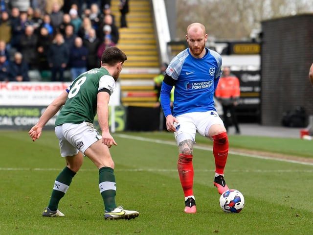 Connor Ogilvie takes on Joe Edwards during Pompey's clash with promotion hopefuls Plymouth. Picture: Graham Hunt/ProSportsImages
