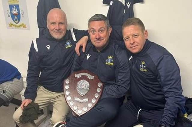 From left - Kieron Hoolihan, Darren Lambe and Steve Ledger with the Hampshire Combination East Division trophy. Picture: BMR FC.