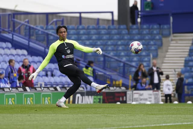 Pompey goalkeeper Josh Oluwayemi warming up before kick-off