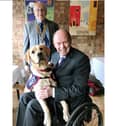 President Norman Chapman from Fareham Rotary Club with Allen Parton and one of his ‘cadets’ from  Hounds for Heroes.