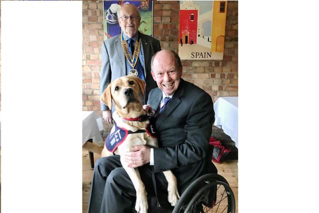 President Norman Chapman from Fareham Rotary Club with Allen Parton and one of his ‘cadets’ from  Hounds for Heroes.