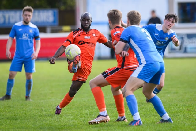 Action from the 2-2 draw between AFC Portchester under-23s (orange and black kit) and Liphook United. Picture: Keith Woodland (150421-709)