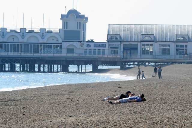 City leaders reminded residents to keep social distancing despite the reduction in new cases. Pictured: Southsea seafront during 'lockdown' due to the coronavirus pandemic on Good Friday, April 10. Picture: Sarah Standing (100420-745)
