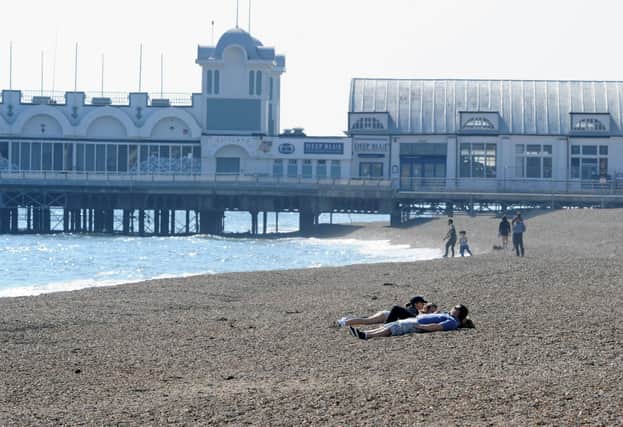 City leaders reminded residents to keep social distancing despite the reduction in new cases. Pictured: Southsea seafront during 'lockdown' due to the coronavirus pandemic on Good Friday, April 10. Picture: Sarah Standing (100420-745)