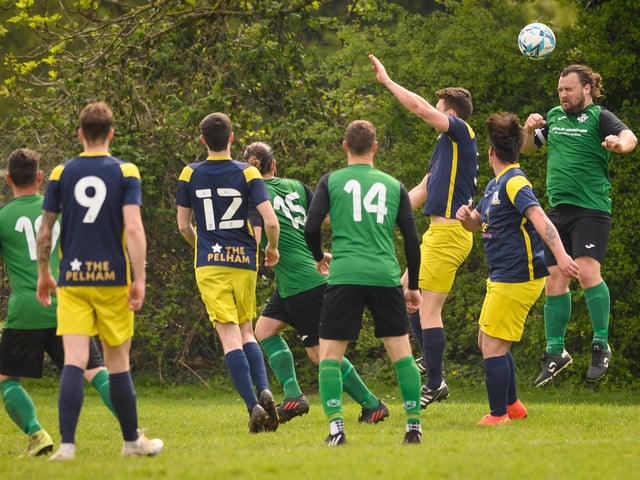 Action from Saturn Royale's 1-0 win over Pelham Arms (blue and yellow kit) in the second Adelaide Cup semi-final. Picture: Keith Woodland (300421-443)