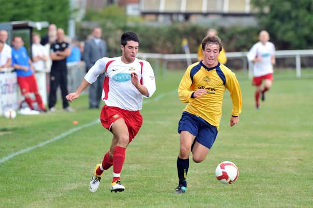 Conor Bailey, right, in action for Moneyfields against Gosport Borough in an FA Cup tie in September 2011. Picture: Steve Reid