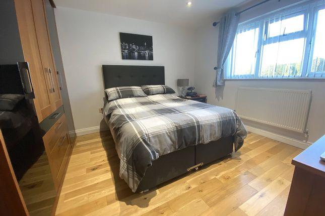One of the four bedrooms.
