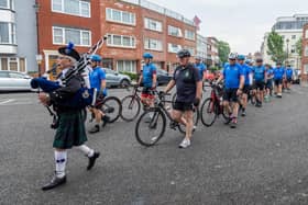 A piper escorts members of the Falklands 40 Cyclists to the service at Old Portsmouth. 
Picture: Mike Cooter