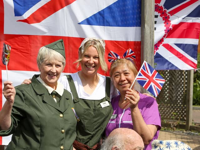 Carers Vanda. Lucy and Zhao at Parker Meadows on VE Day.