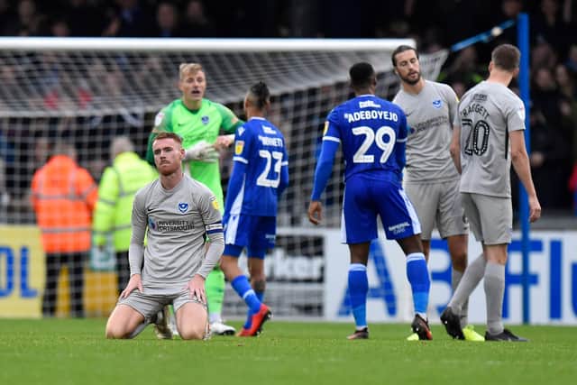Tom Naylor dejected after Pompey's 2-2 draw at Bristol Rovers. Picture: Graham Hunt