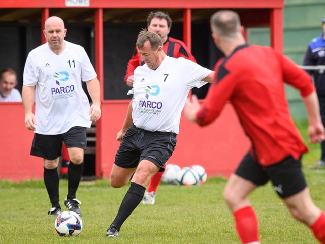Action from the Jon Gittens memorial charity match between a team of former Fareham Town players and a side of ex-Pompey and Southampton professionals. Picture: Keith Woodland (160421-319)