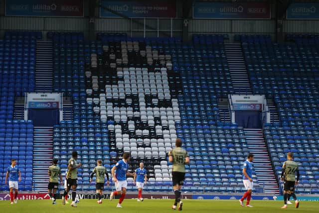 Jimmy Dickinson emblazoned on the Fratton End seats. Picture: PinPep Media / Joe Pepler.