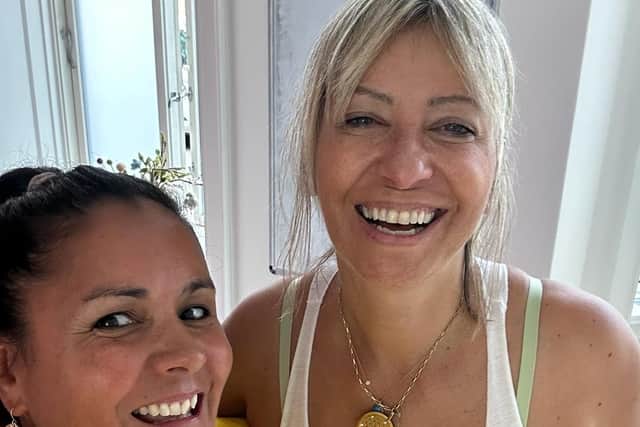 Carla Williams (in yellow) and Maya Fiennes.