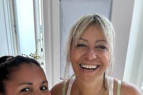 Carla Williams (in yellow) and Maya Fiennes.