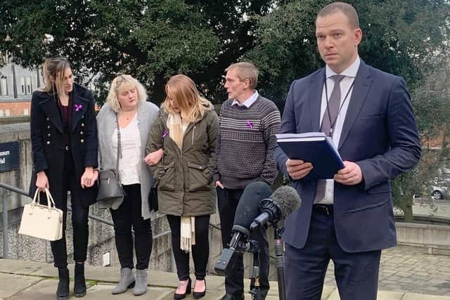 The family of Louise Smith outside Winchester Crown Court on Tuesday, December, 8, after Shane Mays was found guilty of murder. Pictured is: (right) DI Adam Edwards with dad of Louise Smith behind Bradley Smith. Picture: Ben Fishwick
