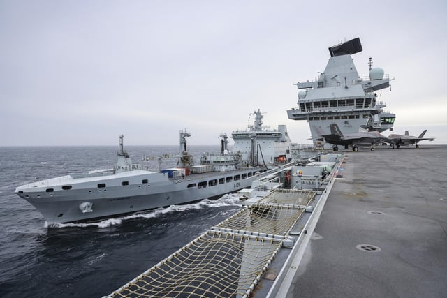 RFA Tidesurge alongside HMS Prince of Wales during a replenishment at sea task.