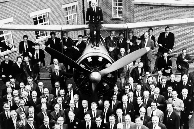Telegraphist Air Gunners (TAGS) Association members outside the Chief petty officers' mess at HMS Daedalus, circa late 1960s. TAGs operated in FAA aircraft from 1922 - 1950 providing communications by Morse code and manning the rear gun of an aircraft. Picture: The News PP3048