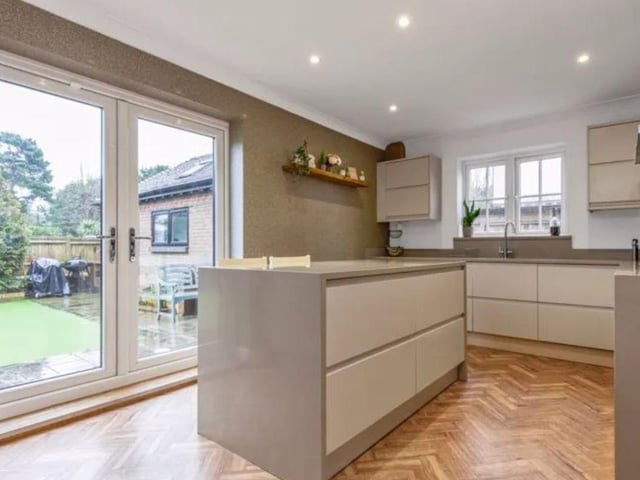 The listing says: "This eye-catching family home offers a spacious four bedroom, two bathroom layout extending to 1564 sq. Ft., enhanced by generous off-road parking with in-and-out driveway, plus a detached studio in the rear garden, perfect for home working or a versatile hobby space."