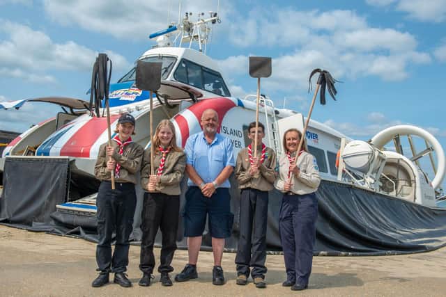 IOW Explorer Scouts display their fire-beaters. Picture: @srf